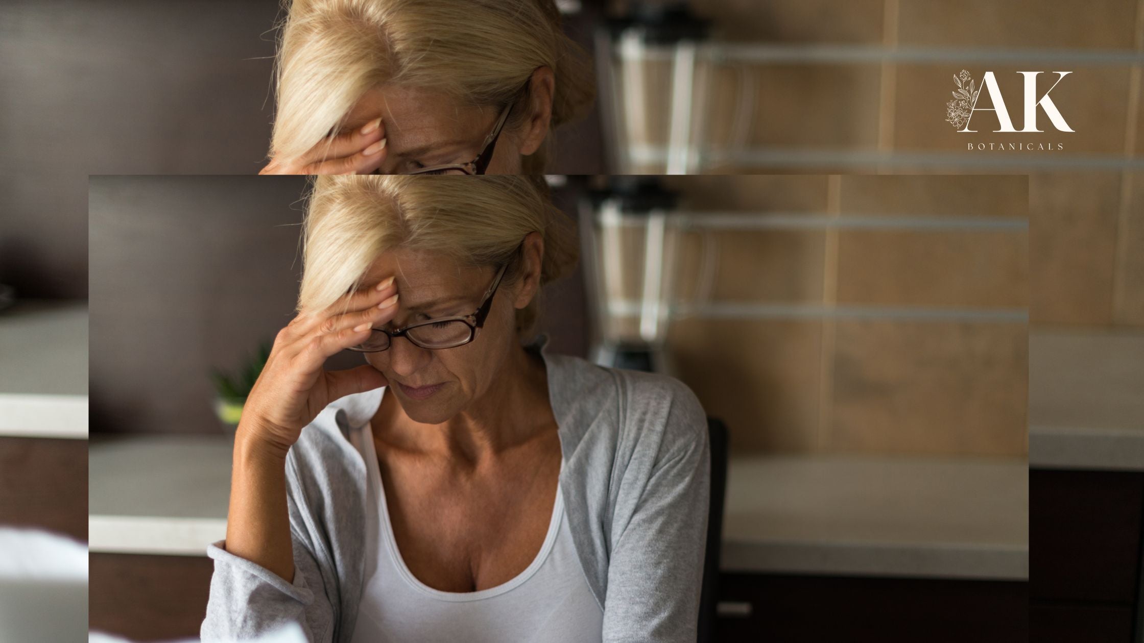 Concerned middle-aged woman touching forehead, reflecting emotional toll of an actinic keratosis diagnosis — AKti-Clear skincare support for sun-damaged skin.